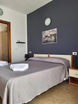 Letto o letti in una camera di White Sand affittacamere