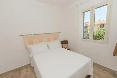 Letto o letti in una camera di Casa Antu - Appartamento con 2 camere in centro abitato