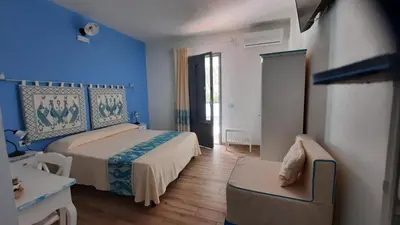 Letto o letti in una camera di Hotel Made