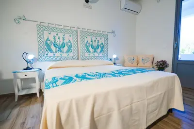 Letto o letti in una camera di Hotel Made