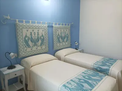 Letto o letti in una camera di Hotel Made
