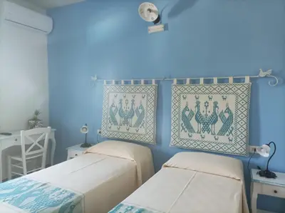 Letto o letti in una camera di Hotel Made