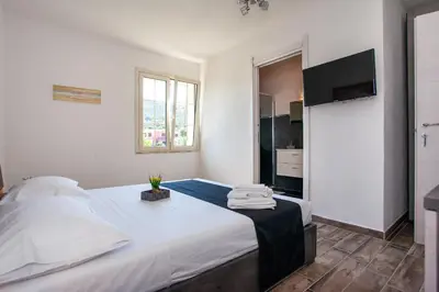 Letto o letti in una camera di Terre di gallura