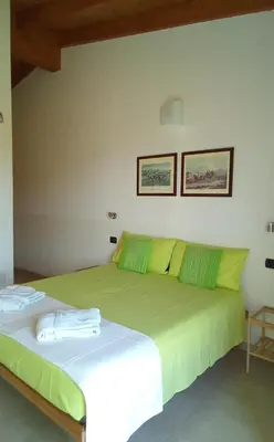 Letto o letti in una camera di B&B Andrieddu