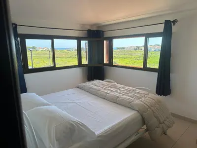 Letto o letti in una camera di Appartamento vista mare