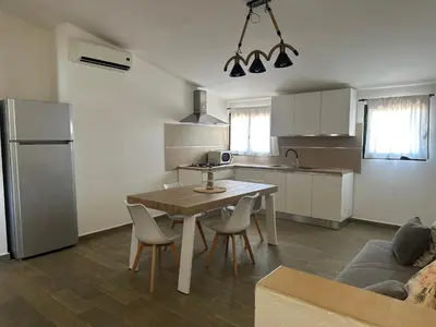 Cucina o angolo cottura di La Caletta Comfort - Wi-Fi, AC, parcheggio