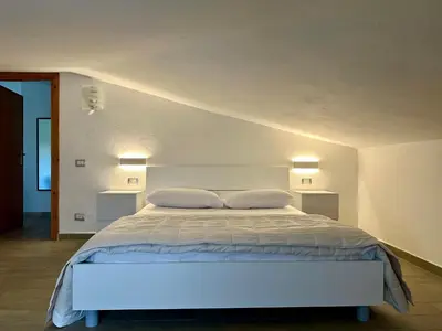 Letto o letti in una camera di La Caletta Comfort - Wi-Fi, AC, parcheggio