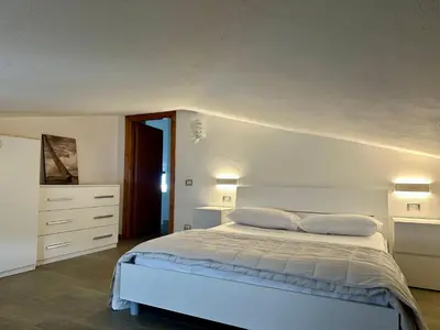 Letto o letti in una camera di La Caletta Comfort - Wi-Fi, AC, parcheggio
