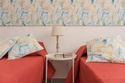 Letto o letti in una camera di Casa Lory - Appartamento con 2 camere in centro abitato
