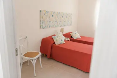 Letto o letti in una camera di Casa Lory - Appartamento con 2 camere in centro abitato