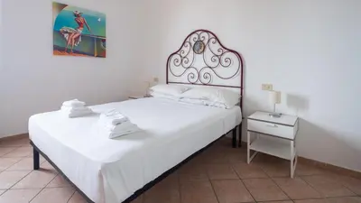 Letto o letti in una camera di Welcomely - Isole Apartments