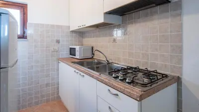 Cucina o angolo cottura di Welcomely - Isole Apartments