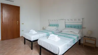 Letto o letti in una camera di Welcomely - Isole Apartments