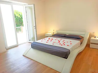 Letto o letti in una camera di Guest House - La bella vita