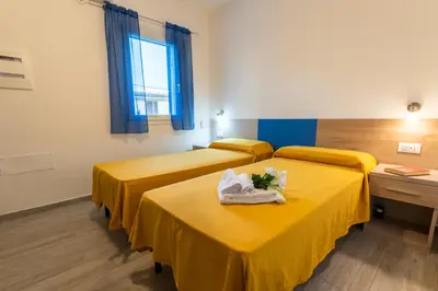 Letto o letti in una camera di Bed & Blu