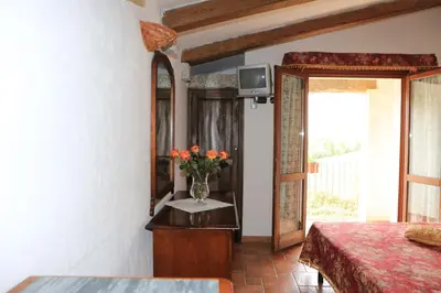 Letto o letti in una camera di Agriturismo Vermentino