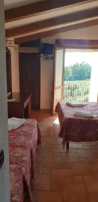Letto o letti in una camera di Agriturismo Vermentino