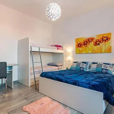 Letto o letti in una camera di Terrace Rooms Olbia Center