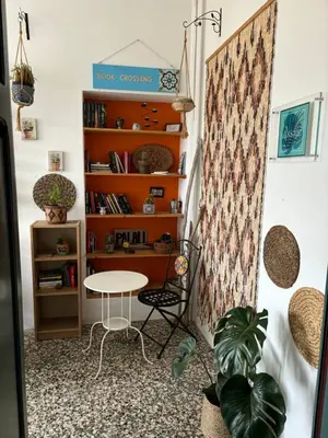Area soggiorno di Assajè Guestroom
