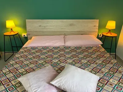 Letto o letti in una camera di Assajè Guestroom