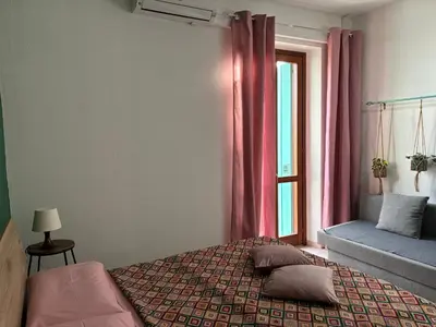 Letto o letti in una camera di Assajè Guestroom