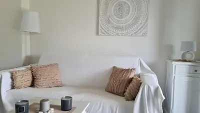 Letto o letti in una camera di Villa vista pineta - 90 mt dalla spiaggia