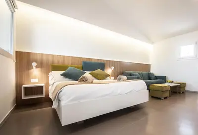 Letto o letti in una camera di Montepetrosu Charming House