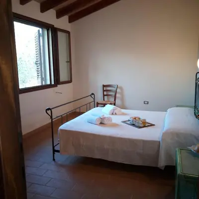 Letto o letti in una camera di Agriturismo Funtan'Arva