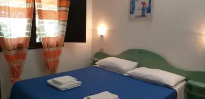 Letto o letti in una camera di Agriturismo Funtan'Arva