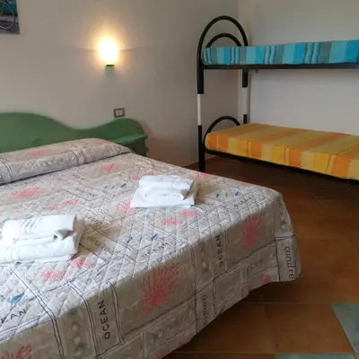 Letto o letti in una camera di Agriturismo Funtan'Arva
