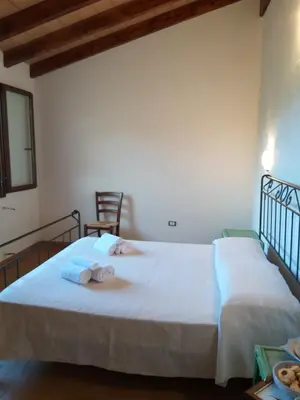 Letto o letti in una camera di Agriturismo Funtan'Arva
