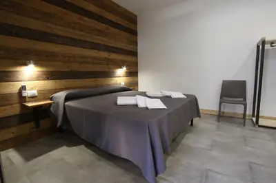 Letto o letti in una camera di Belvedere