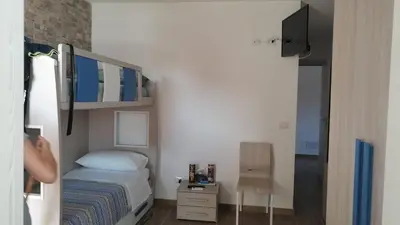 TV o dispositivi per l'intrattenimento presso Affittacamere Sos Ninnitteddos