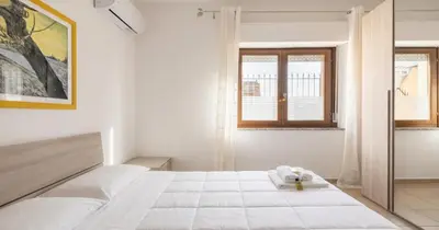 Letto o letti in una camera di Dimoras 3BR City Center Terrace & Parking