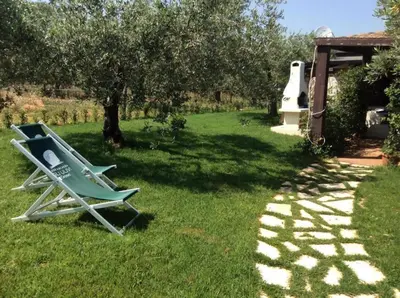 Giardino di Residence con piscina Piricone