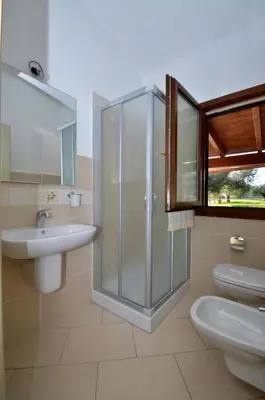 Bagno di Residence con piscina Piricone