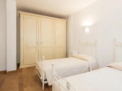Letto o letti in una camera di Villa Elena - Appartamento Vista Mare e Appartamento con Giardino