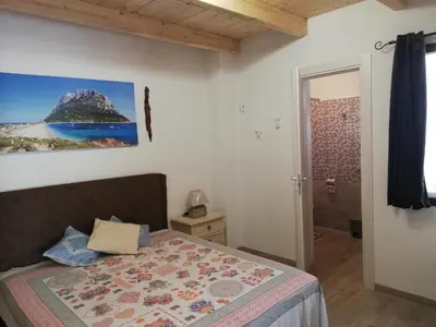 Letto o letti in una camera di Casa Tommy