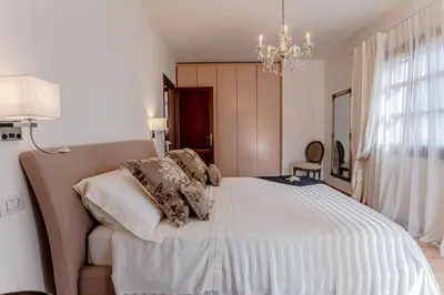 Letto o letti in una camera di Appartamento San Teodoro centro