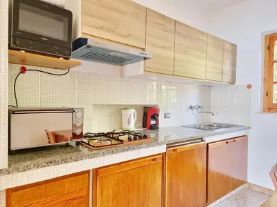 Cucina o angolo cottura di Villa Papiyon - Accesso privato alla spiaggia