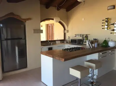 Cucina o angolo cottura di VILLA VISTA MARE INFINITY POOL