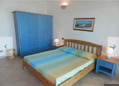 Letto o letti in una camera di APARTMENT PIED DANS L'EAU