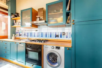 Cucina o angolo cottura di APARTMENT PIED DANS L'EAU