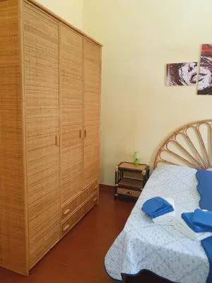 Letto o letti in una camera di Villa Maris