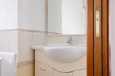 Bagno di Le Residenze di Baia Sant'Anna