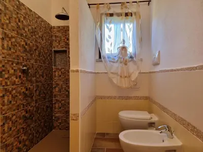 Bagno di Le Residenze di Baia Sant'Anna