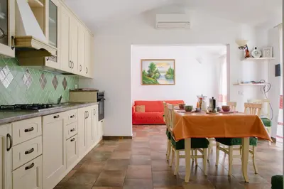 Cucina o angolo cottura di Le Residenze di Baia Sant'Anna