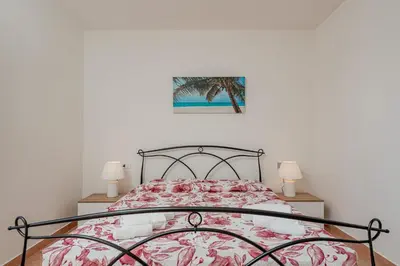 Letto o letti in una camera di Residence Stella Marina