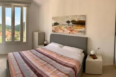 Letto o letti in una camera di neues Haus mit beheiztem Pool