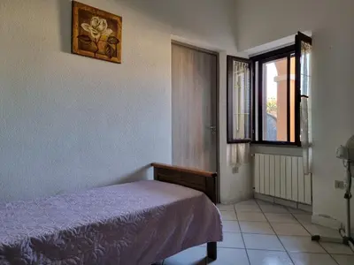 Letto o letti in una camera di Le Residenze di Monte Rena A1 - A2